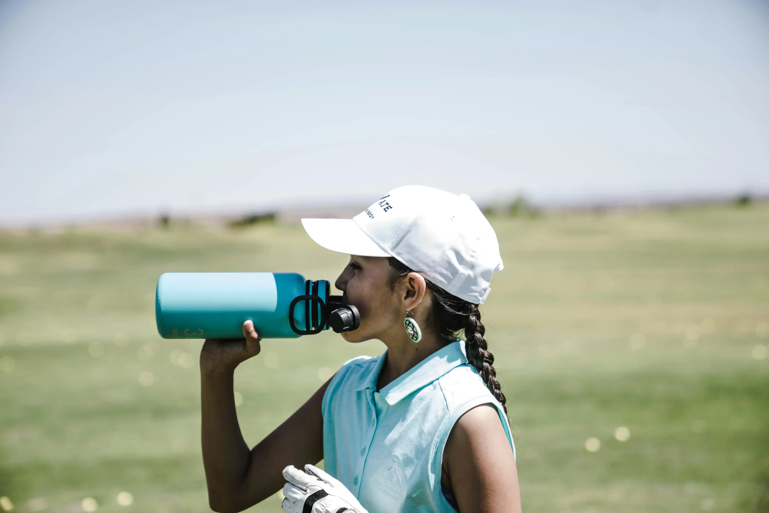 Girl Using Smart Water Bottle